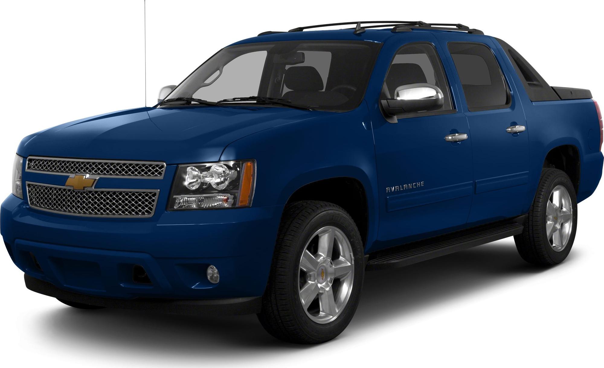 Blue mid-size pickup truck front side view with chrome grille and alloy wheels