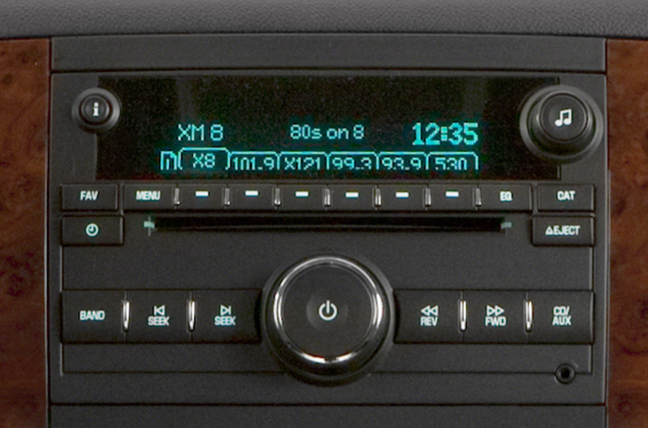 Close-up of car stereo radio console with XM 80s channel display