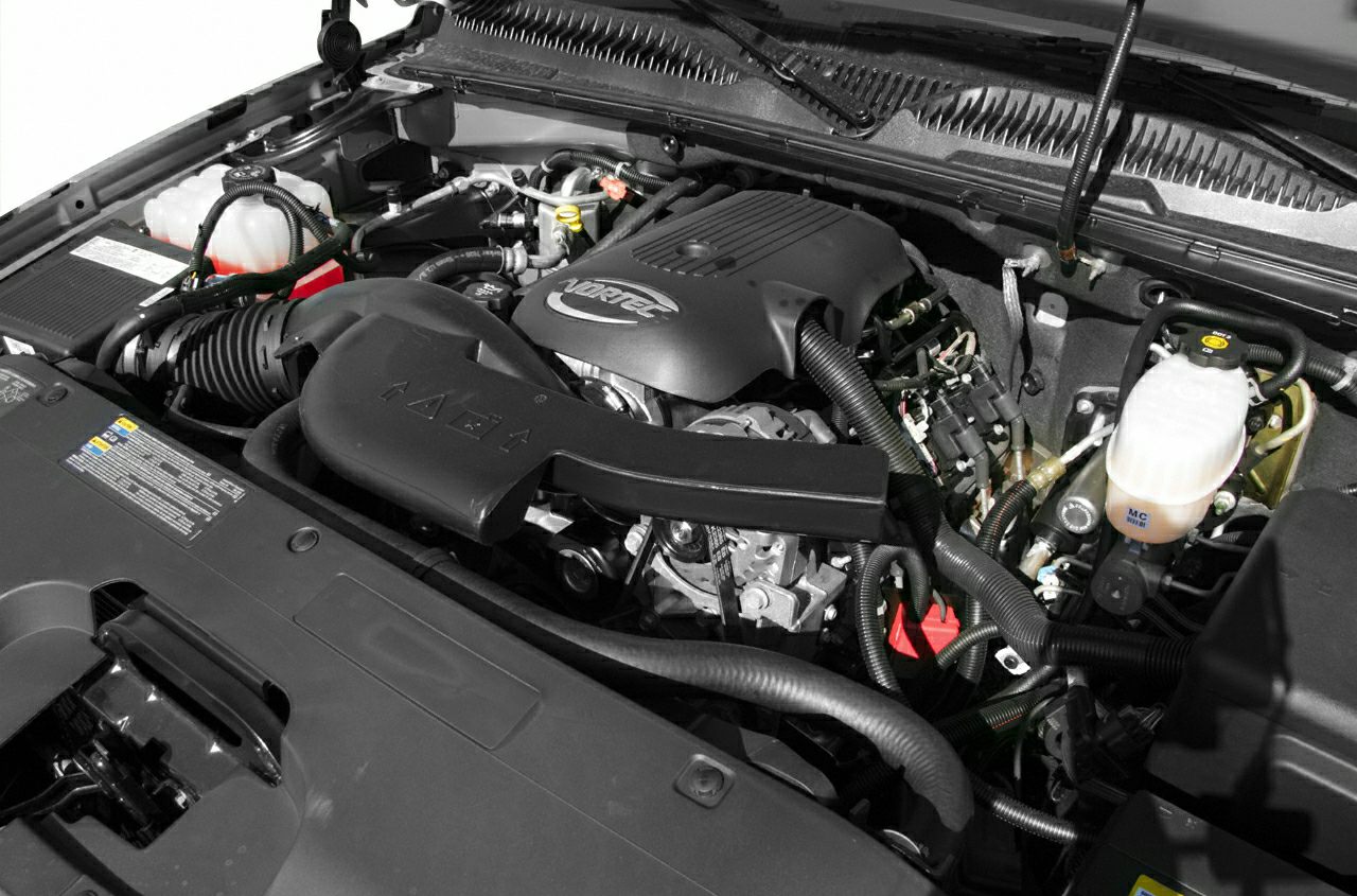 Vortec engine cover and air intake system inside engine compartment