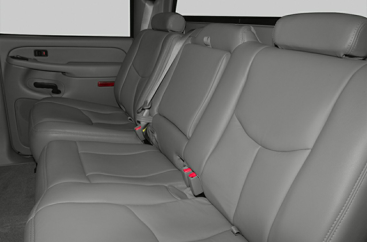 Rear leather seats and door panel with seatbelt close-up
