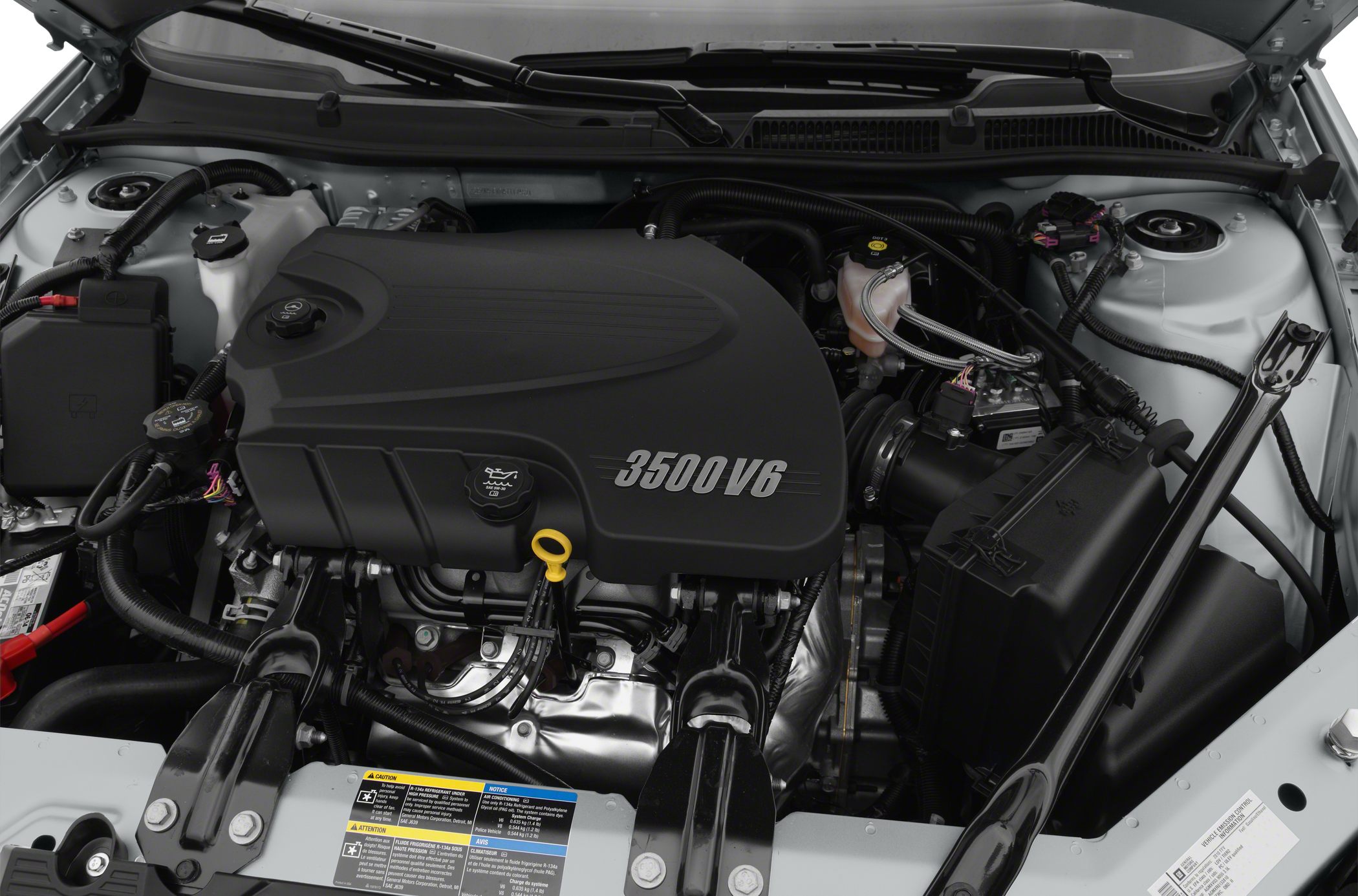 Detailed view of 3500 V6 engine bay with various mechanical and fluid components.