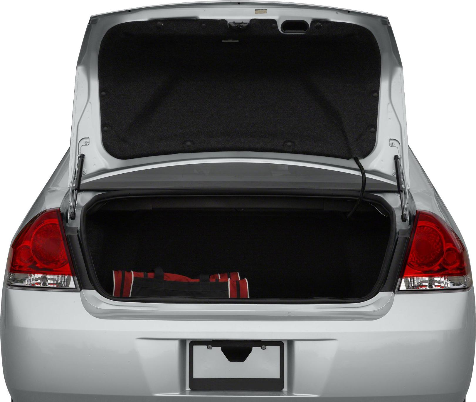 Rear view with open trunk showing spacious cargo area and red bag