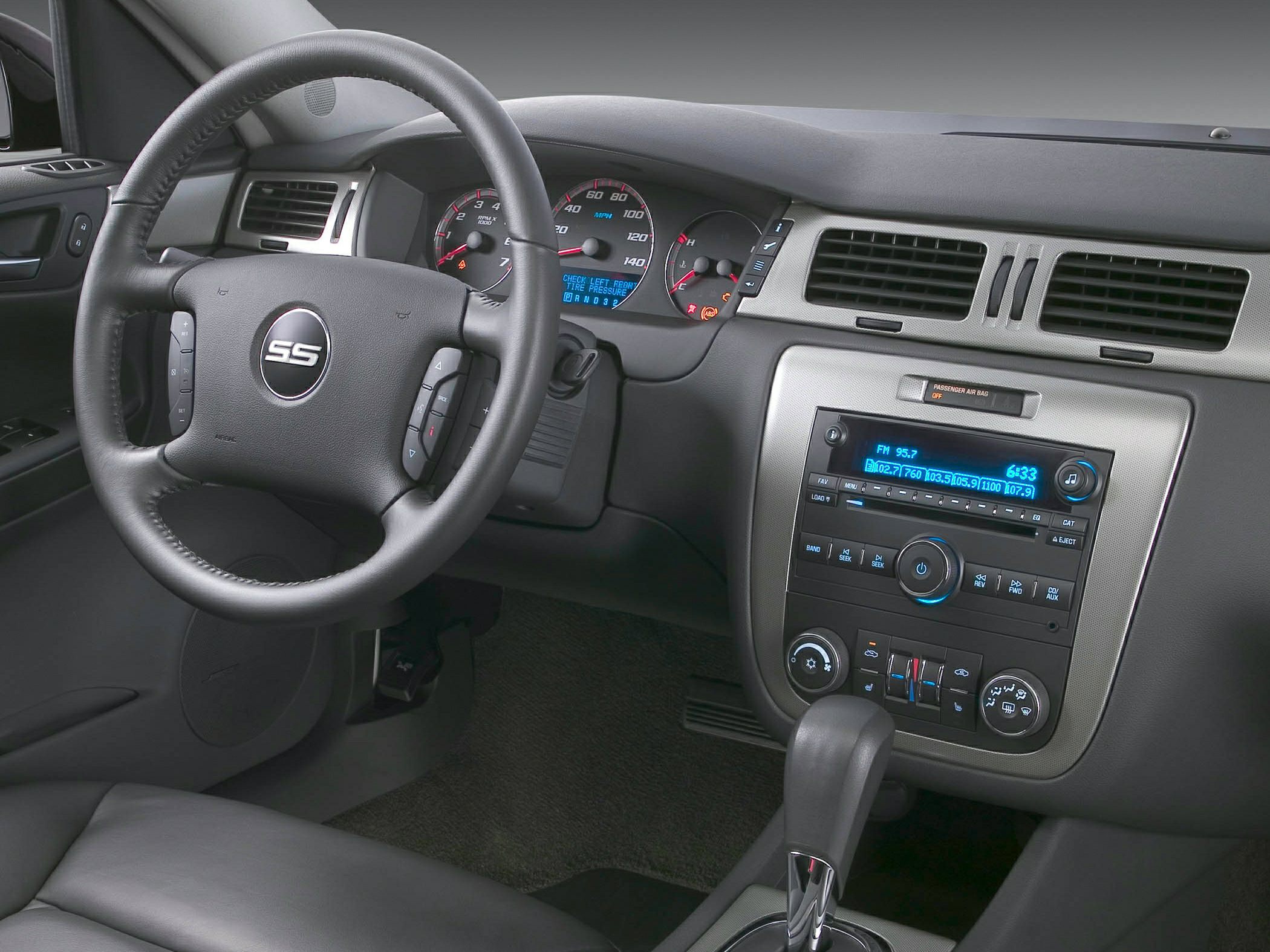 Dashboard and steering wheel with radio and controls