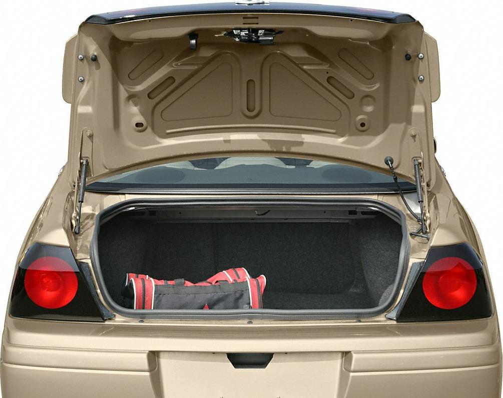 Open trunk and rear taillights view of sedan