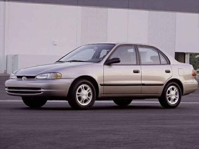 Compact mid-90s sedan with smooth body lines and four doors