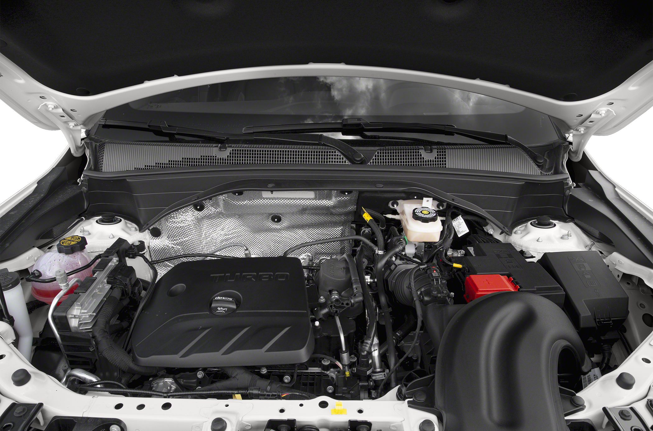 Turbocharged engine bay with covered engine block and organized components