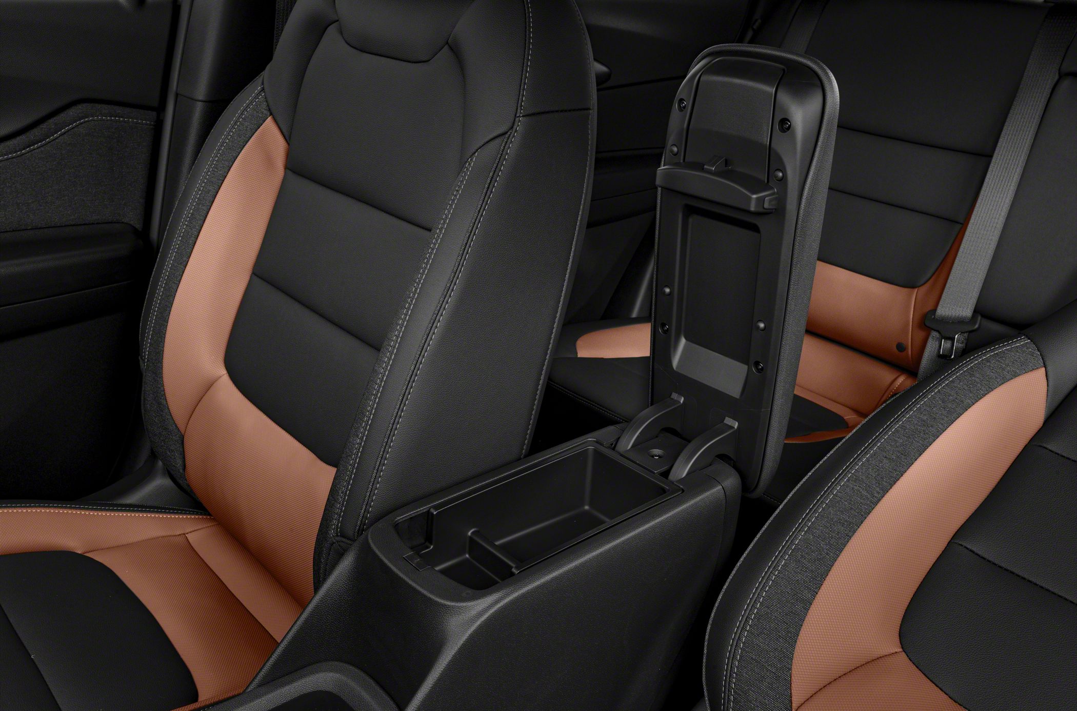 Black and brown two-tone seats with center console storage compartment