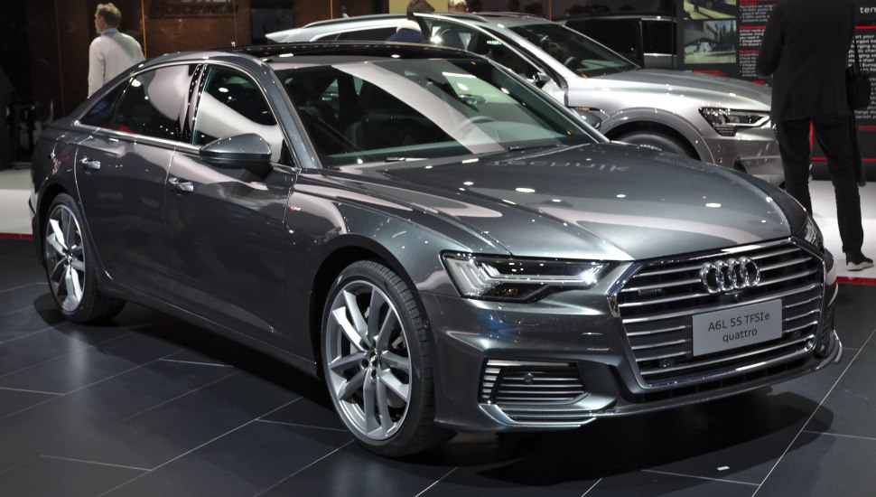 Front and side view of 2019 sedan with LED headlights and alloy wheels
