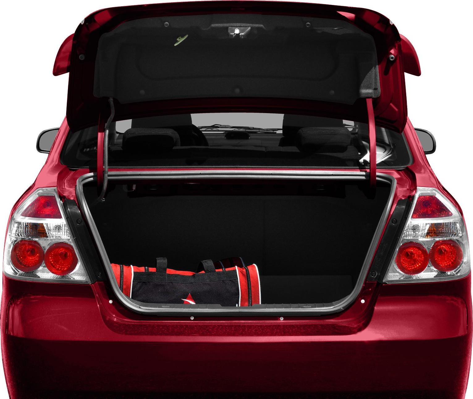 Open trunk of a sedan showing taillights and storage space with bag