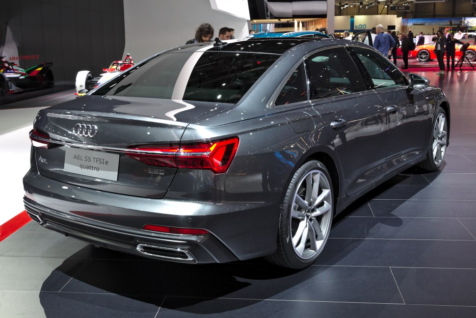 Rear view sedan with distinctive taillights and dual exhaust