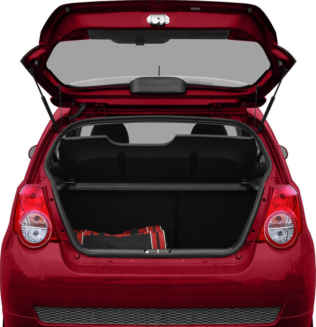 Rear open trunk of a hatchback with visible cargo space and taillights