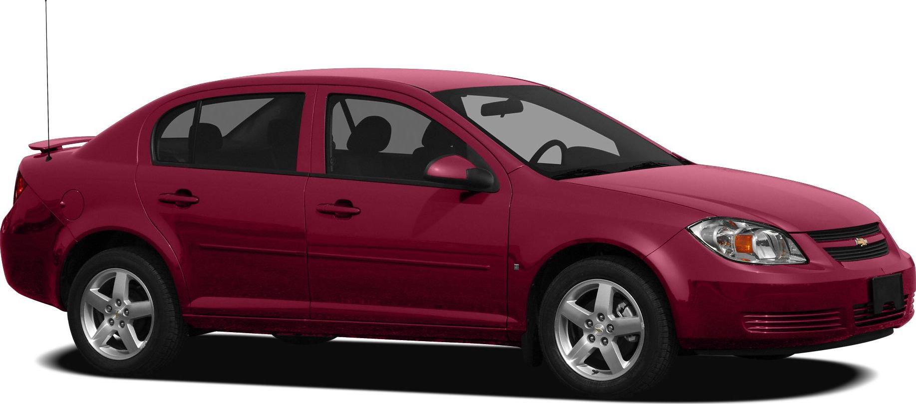 Red compact sedan with front grille, headlights, and alloy wheels side view