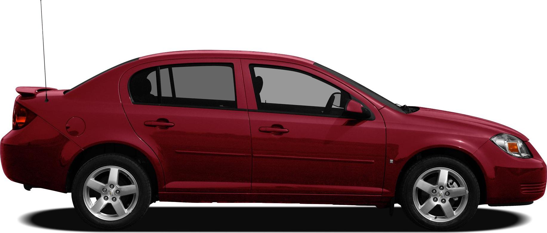 Red sedan side profile with alloy wheels and roof spoiler