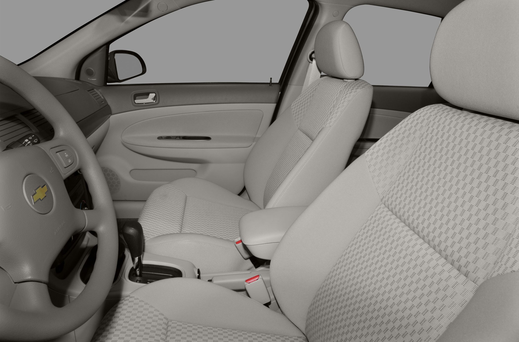 Fabric front seats with center console and steering wheel