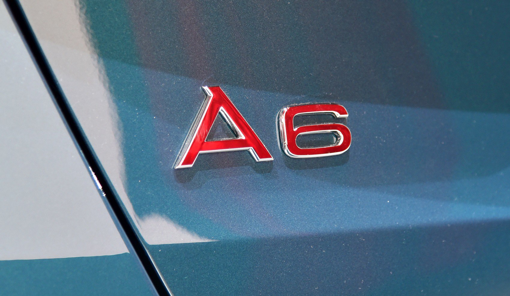 Red A6 emblem badge on car exterior