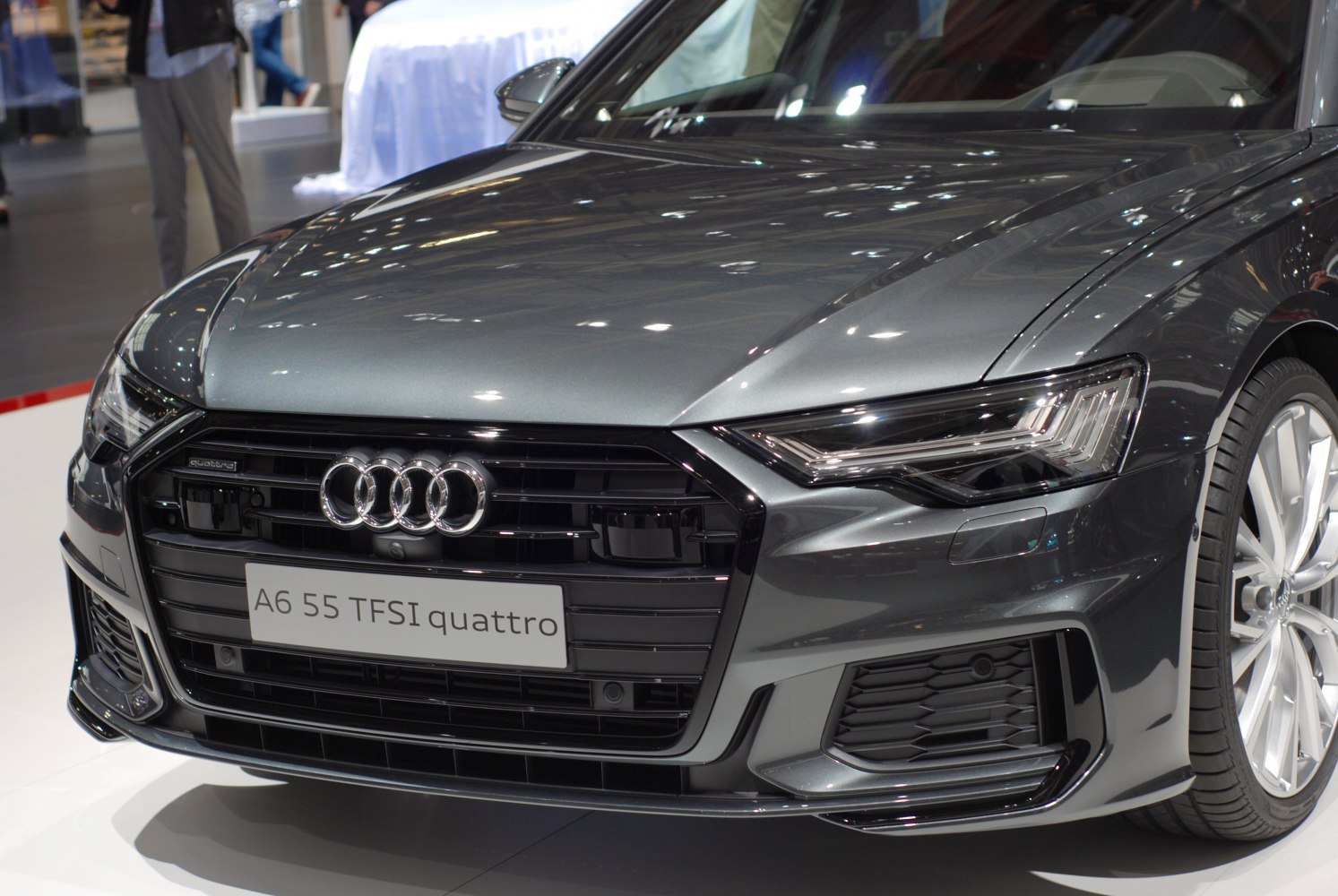 Front grille and LED headlights of a modern luxury sedan
