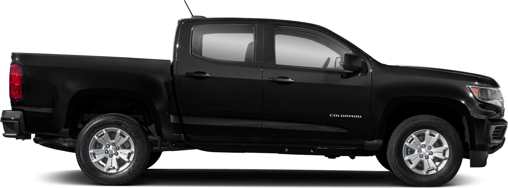 Side profile of a crew cab pickup with short box and distinctive wheels