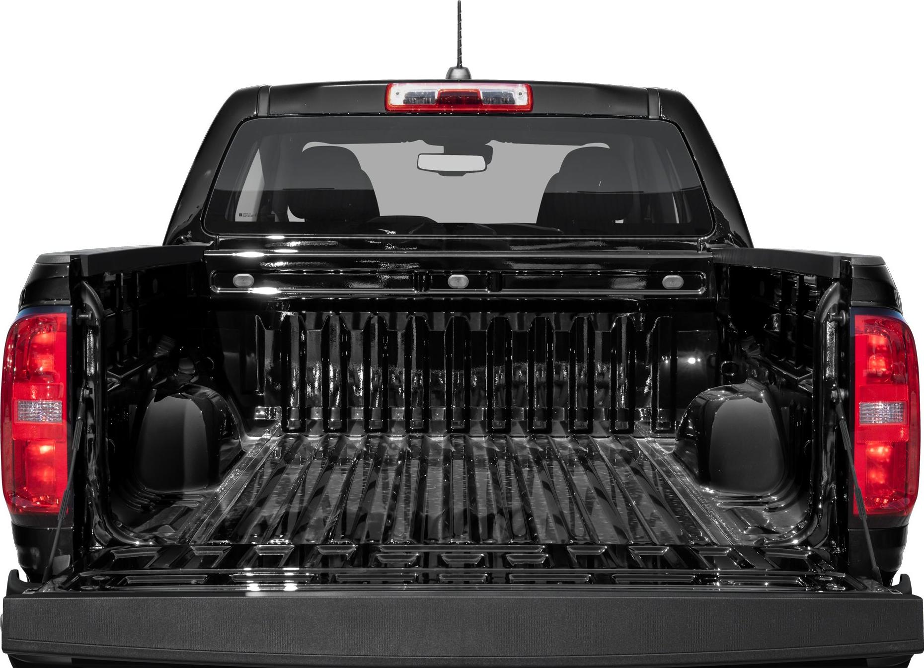 Open truck bed and tailgate of a pickup with visible taillights.