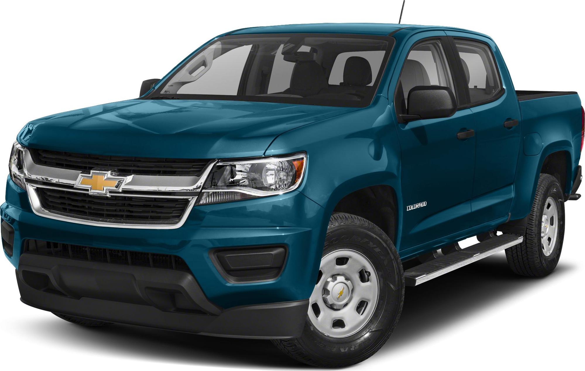 Front angle view of pickup truck with grille and side step