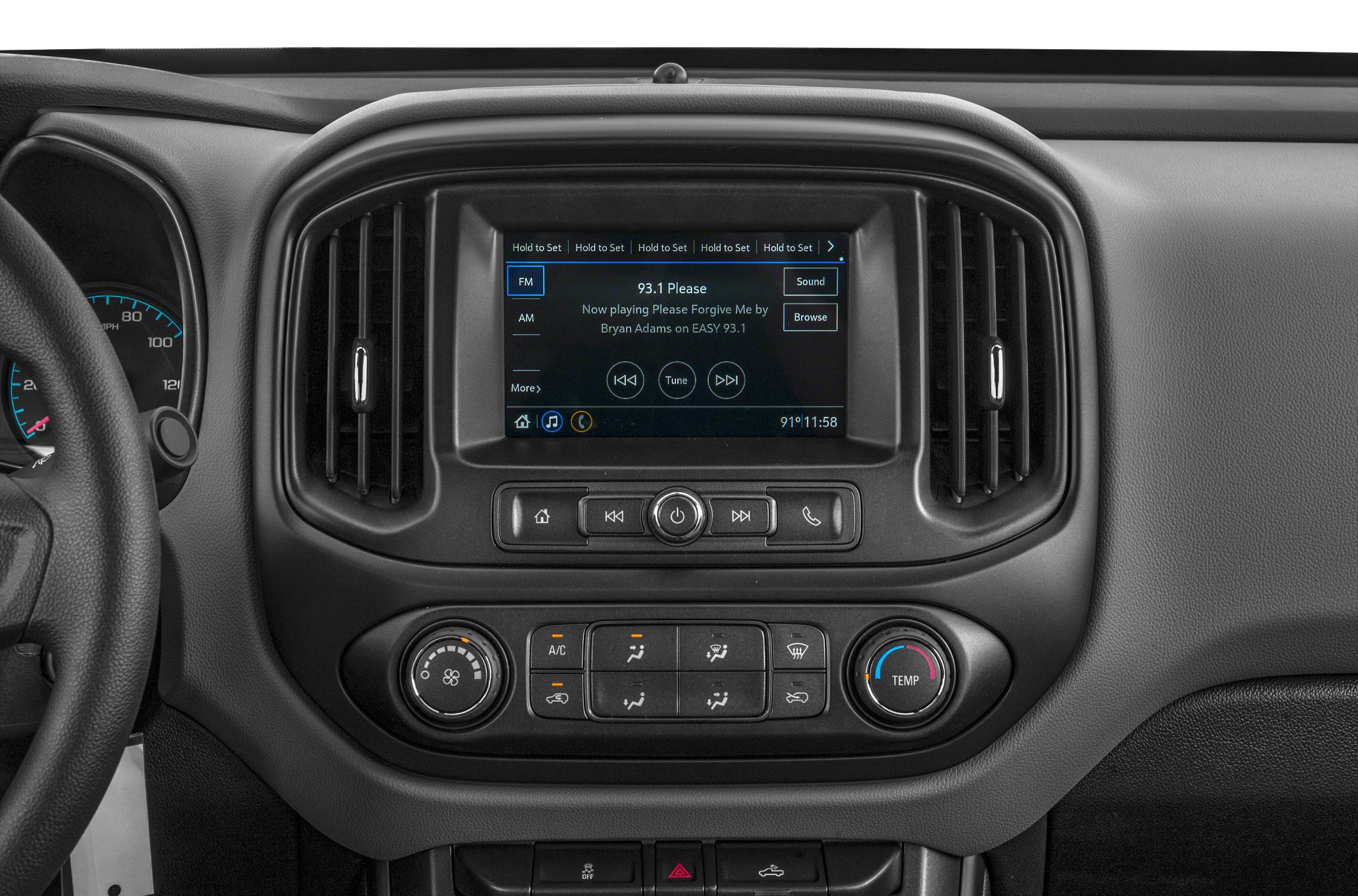 Multimedia touchscreen and climate control panel in pickup truck dashboard