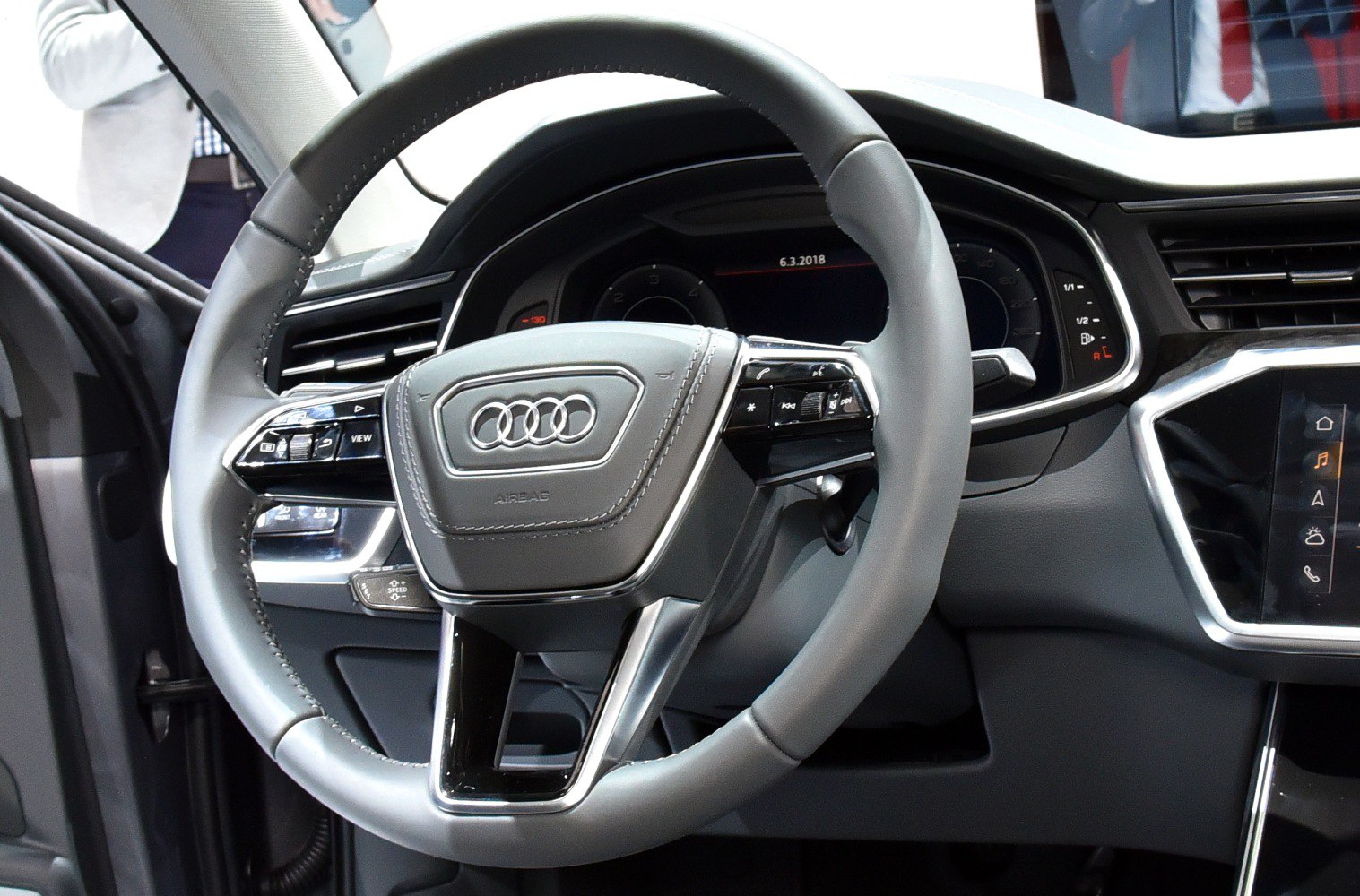Steering wheel with integrated controls and digital dashboard display