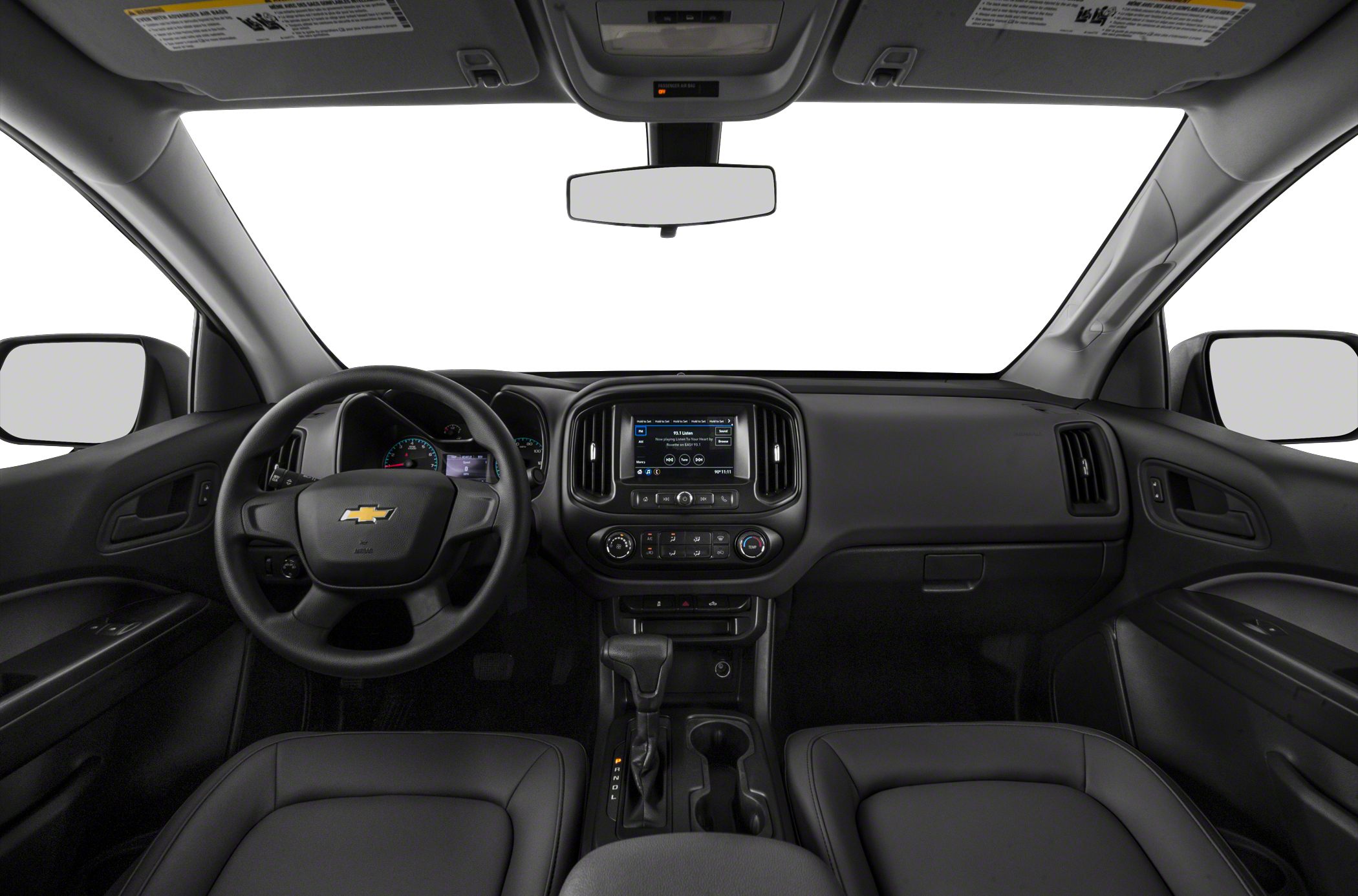 Pickup truck interior with steering wheel, dashboard, infotainment screen, and center console