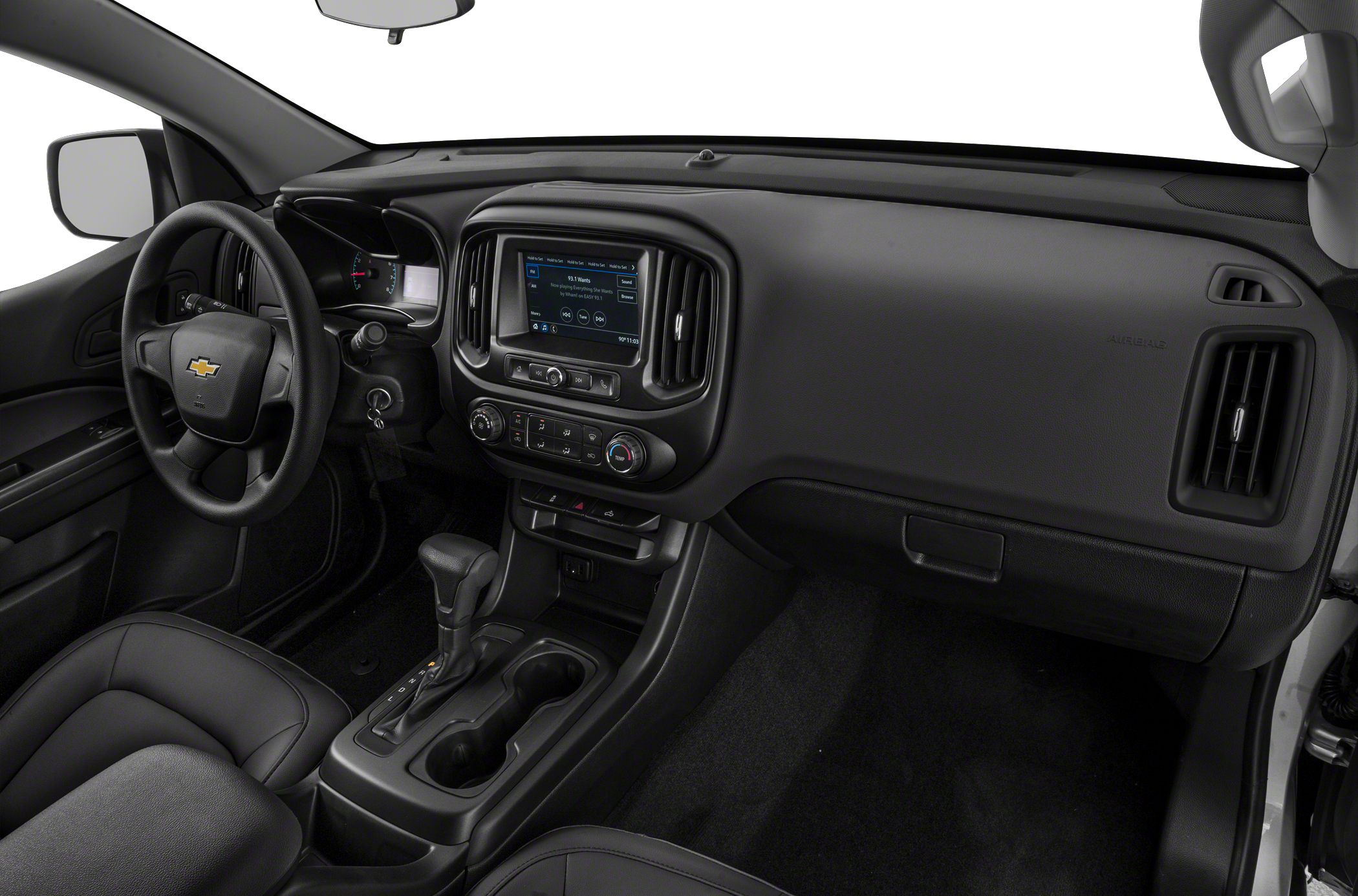 Interior dashboard with infotainment, steering wheel, and center console