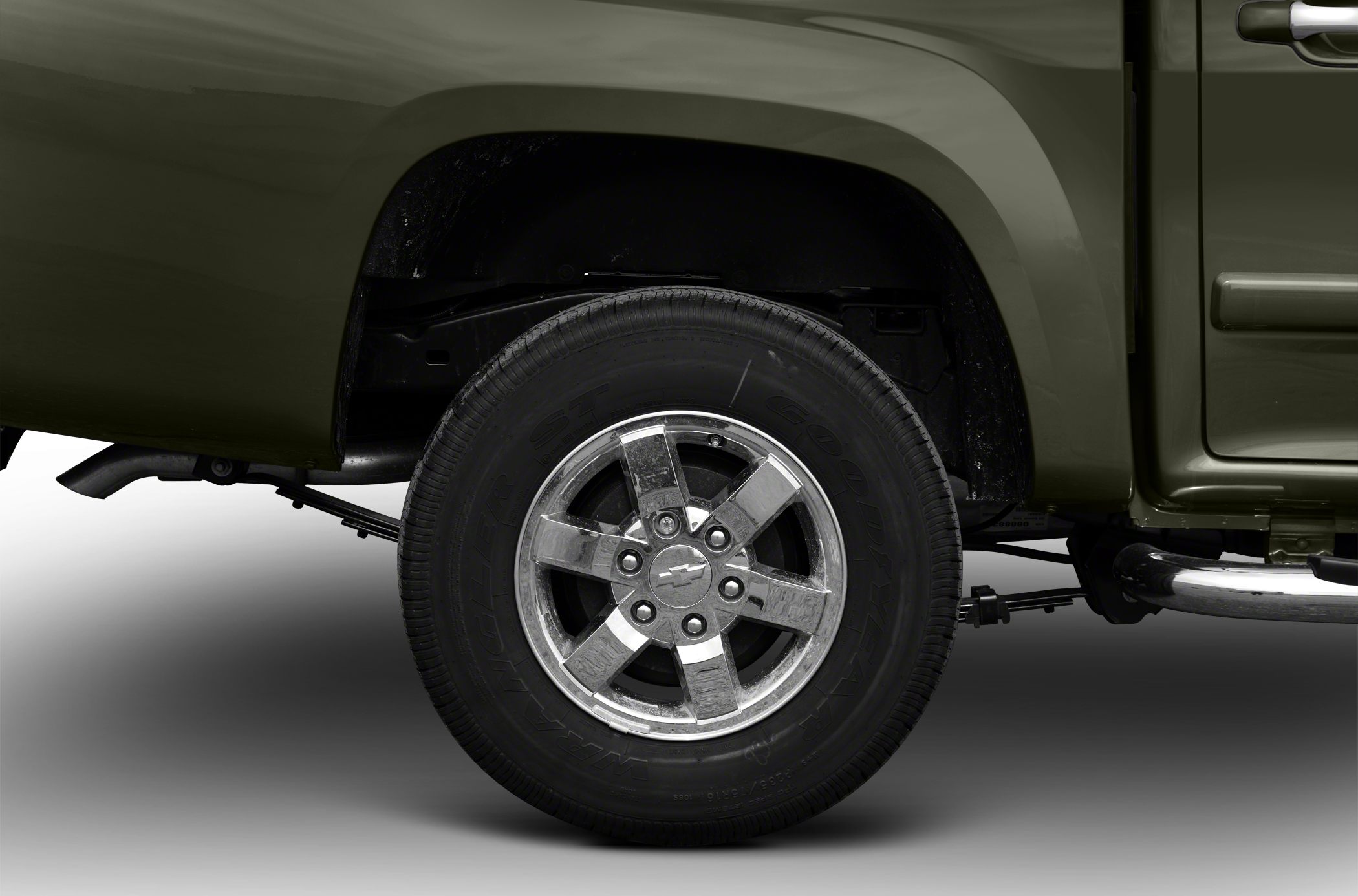 Metallic alloy wheel with leaf spring suspension