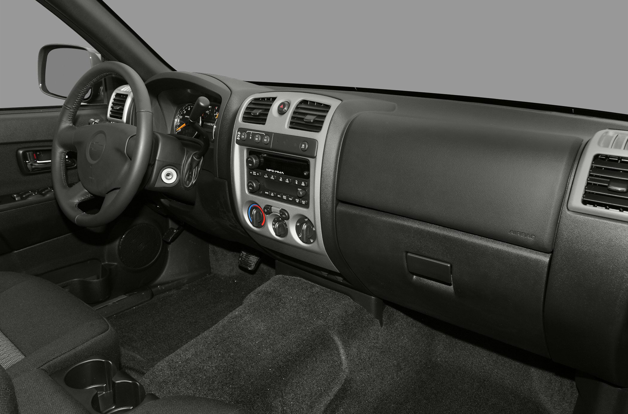 Dashboard, steering wheel, control panel, gauge cluster of a vehicle interior