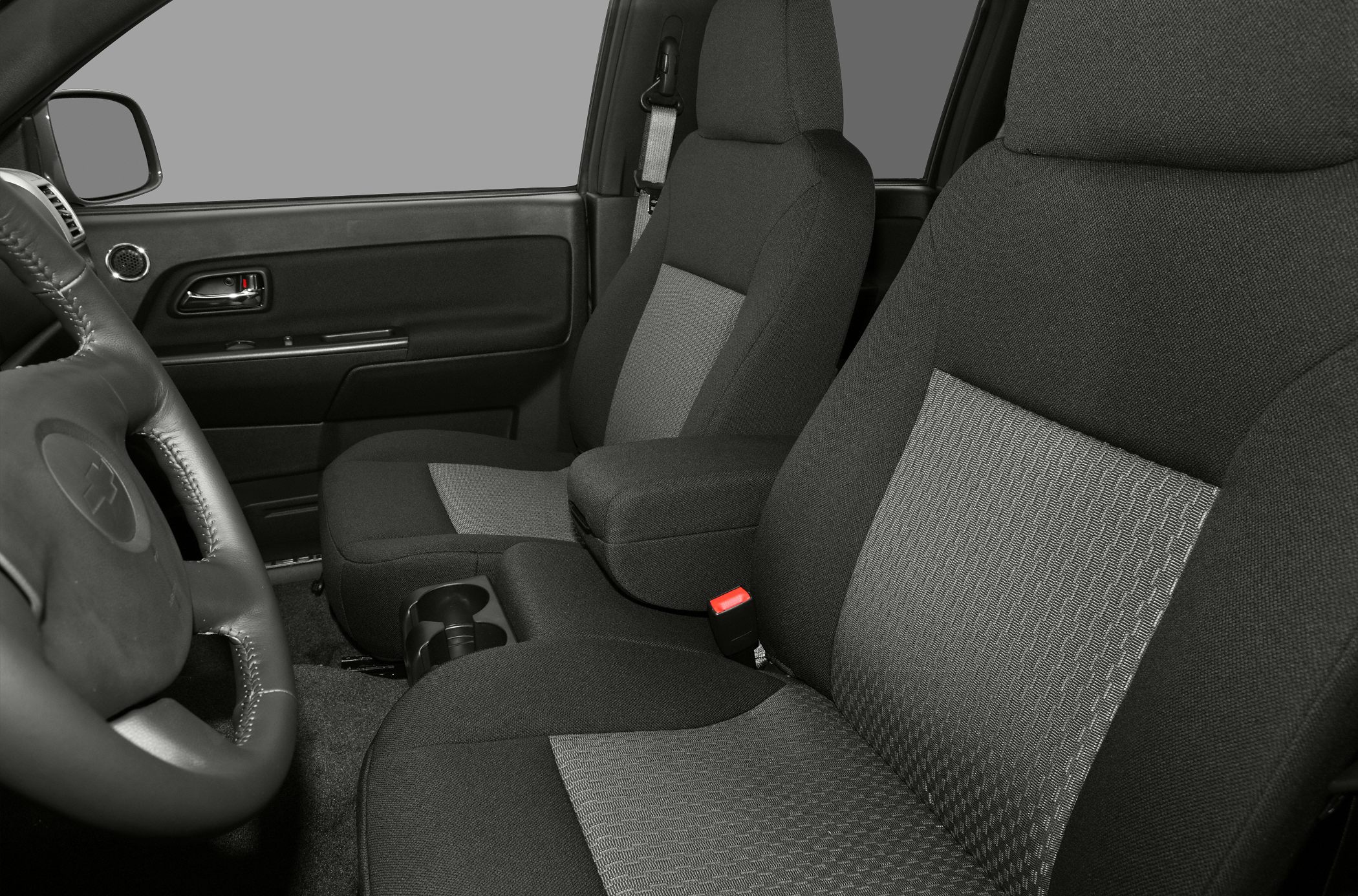 Fabric seats with textured inserts and front interior details
