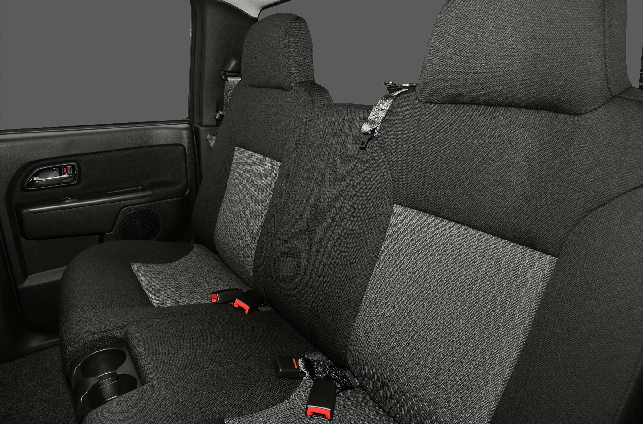 Fabric rear seats, seatbelts, door panel and cup holders