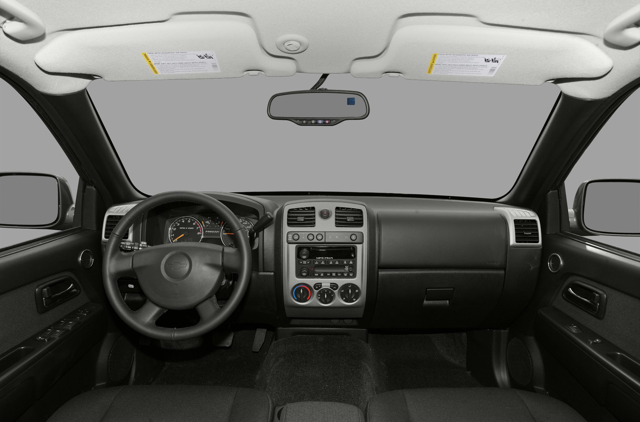Dashboard and steering wheel view with control panel and gauges