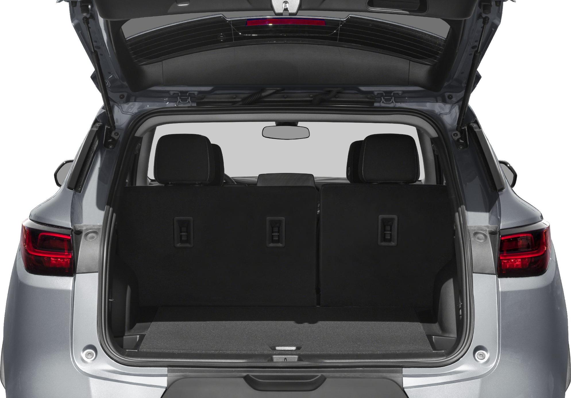 Rear cargo area of SUV with seats upright and open tailgate