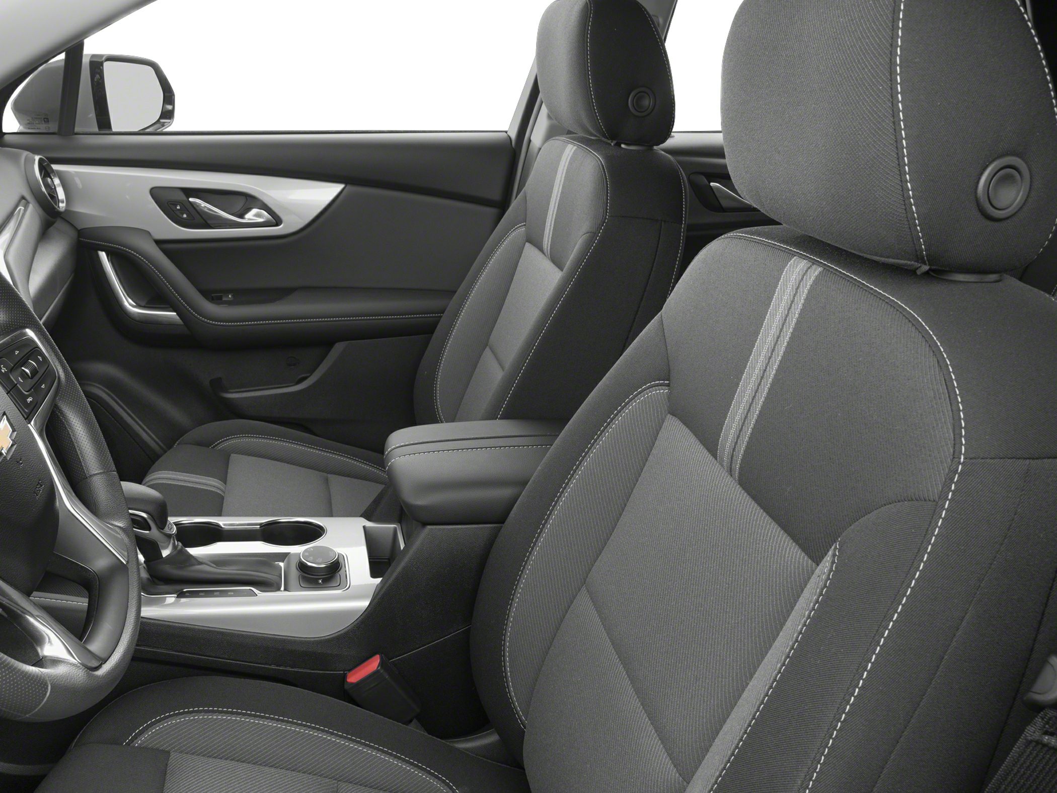 Close-up of front seats and center console upholstery with stitching detail