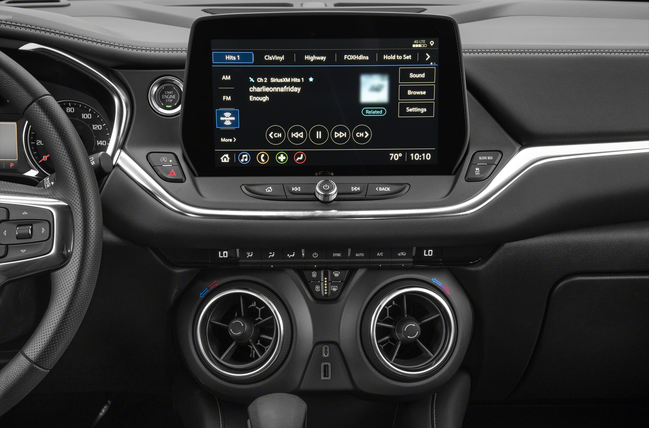 Infotainment screen and dual circular air vents with climate controls