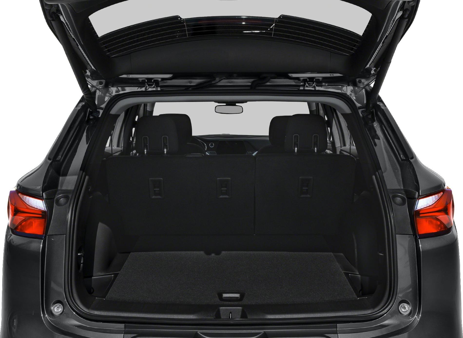 Open rear cargo area and tailgate of SUV with visible seats