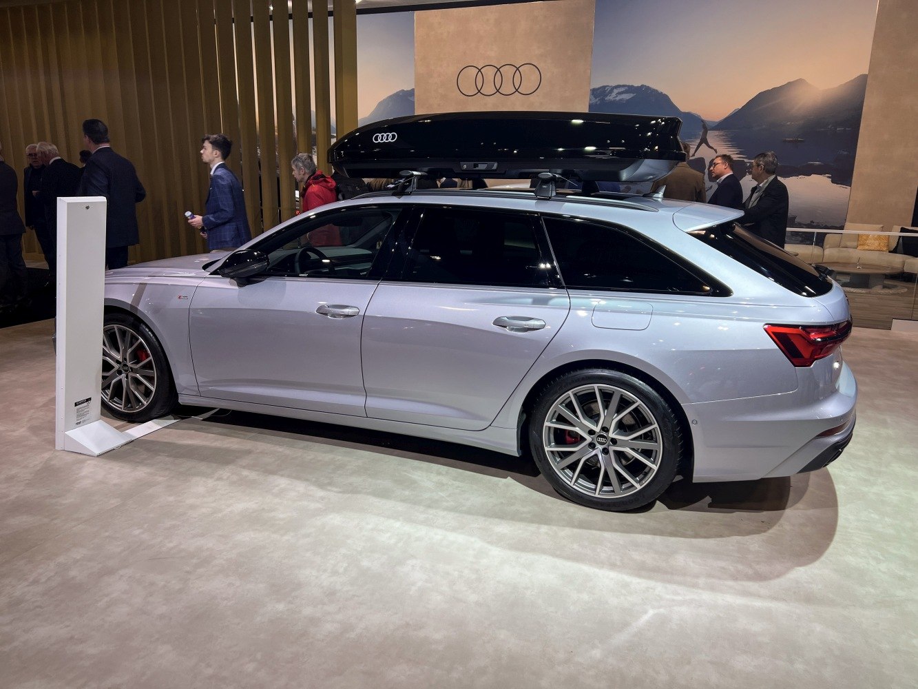 Station wagon with alloy wheels and black roof box