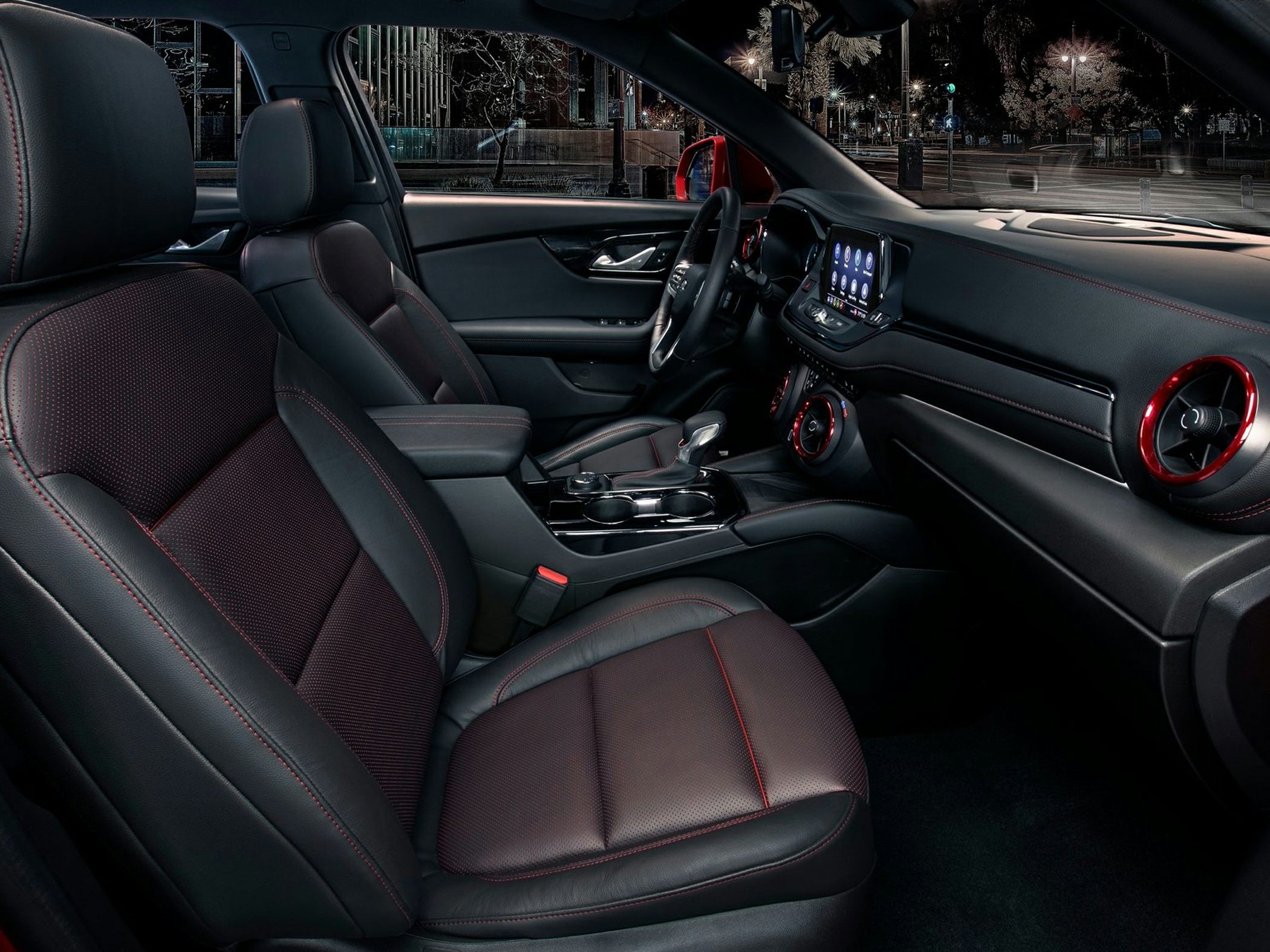 Leather seats with red stitching and modern dashboard interior