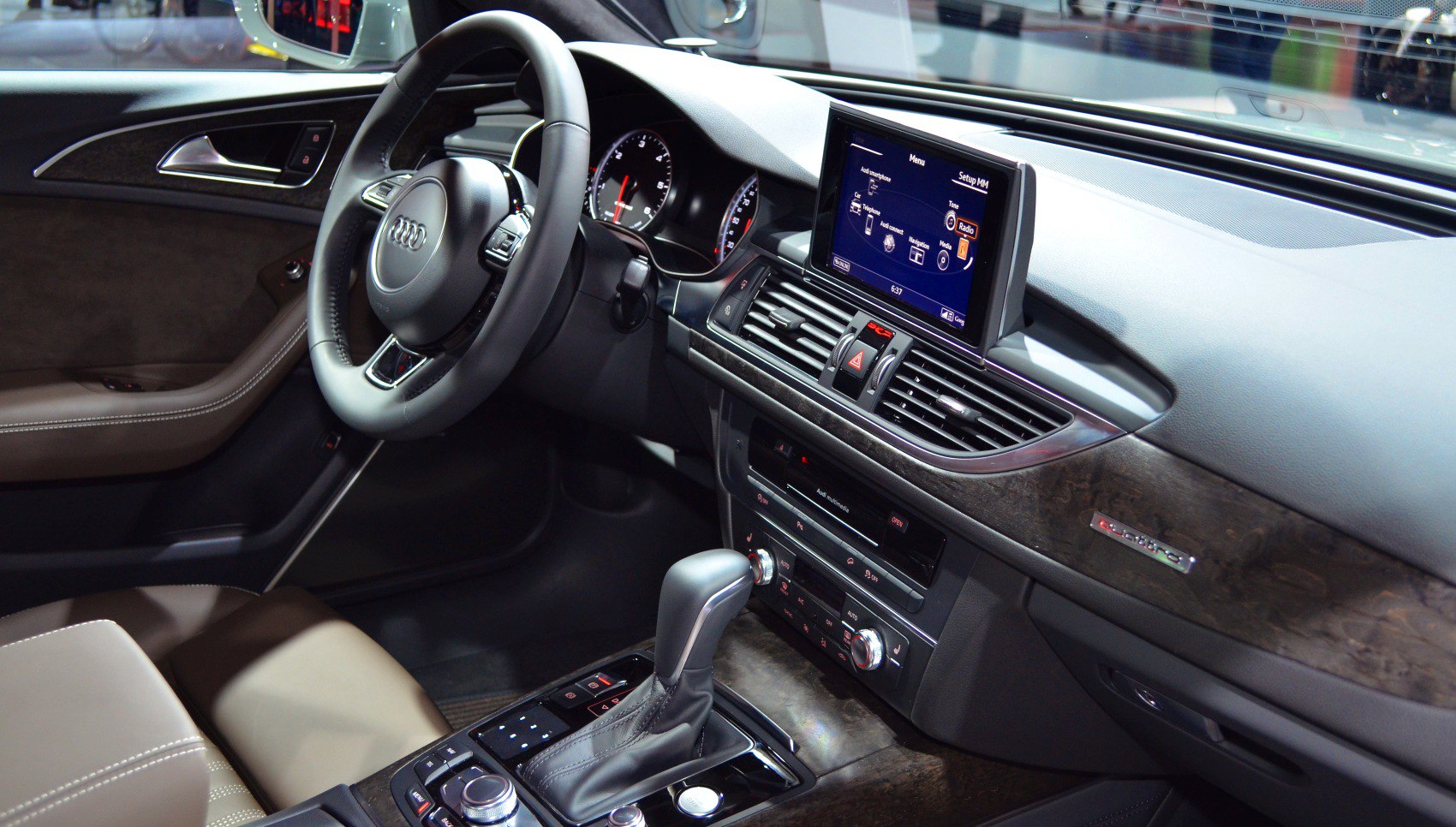 Dashboard, steering wheel, gear shift, and infotainment display