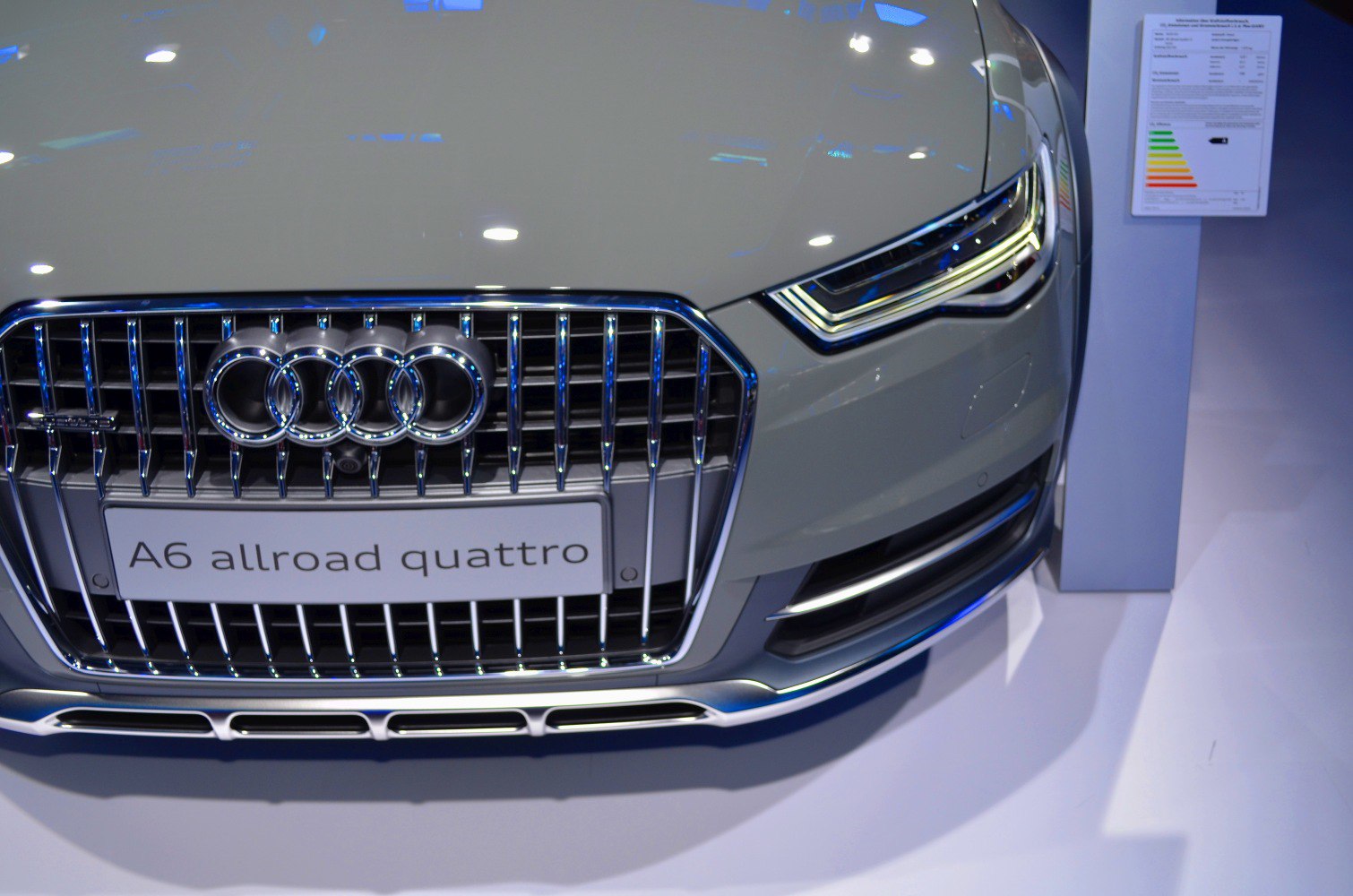 Close-up of luxury car front grille and LED headlight