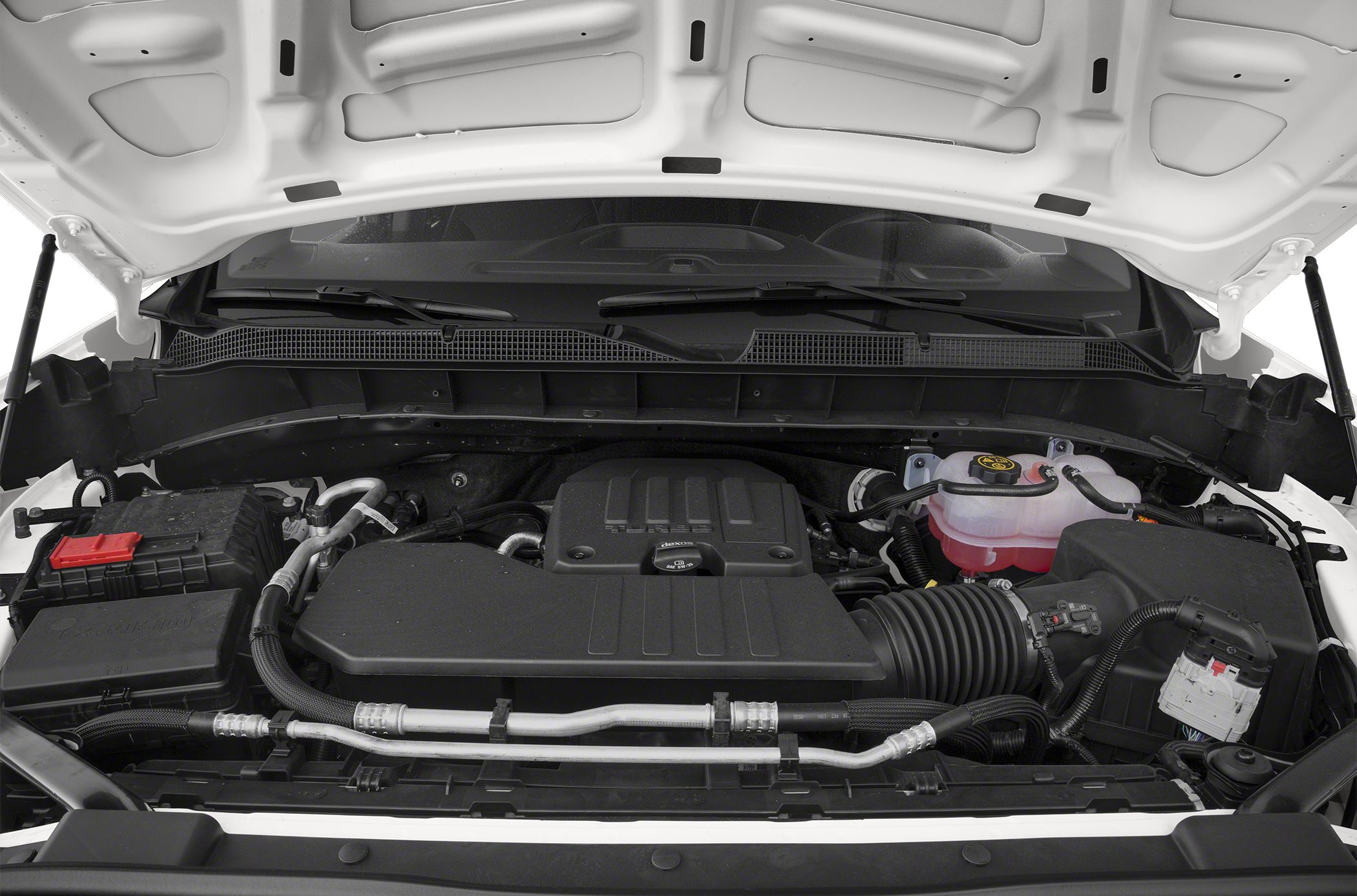 Engine compartment with covered engine and fluid reservoir