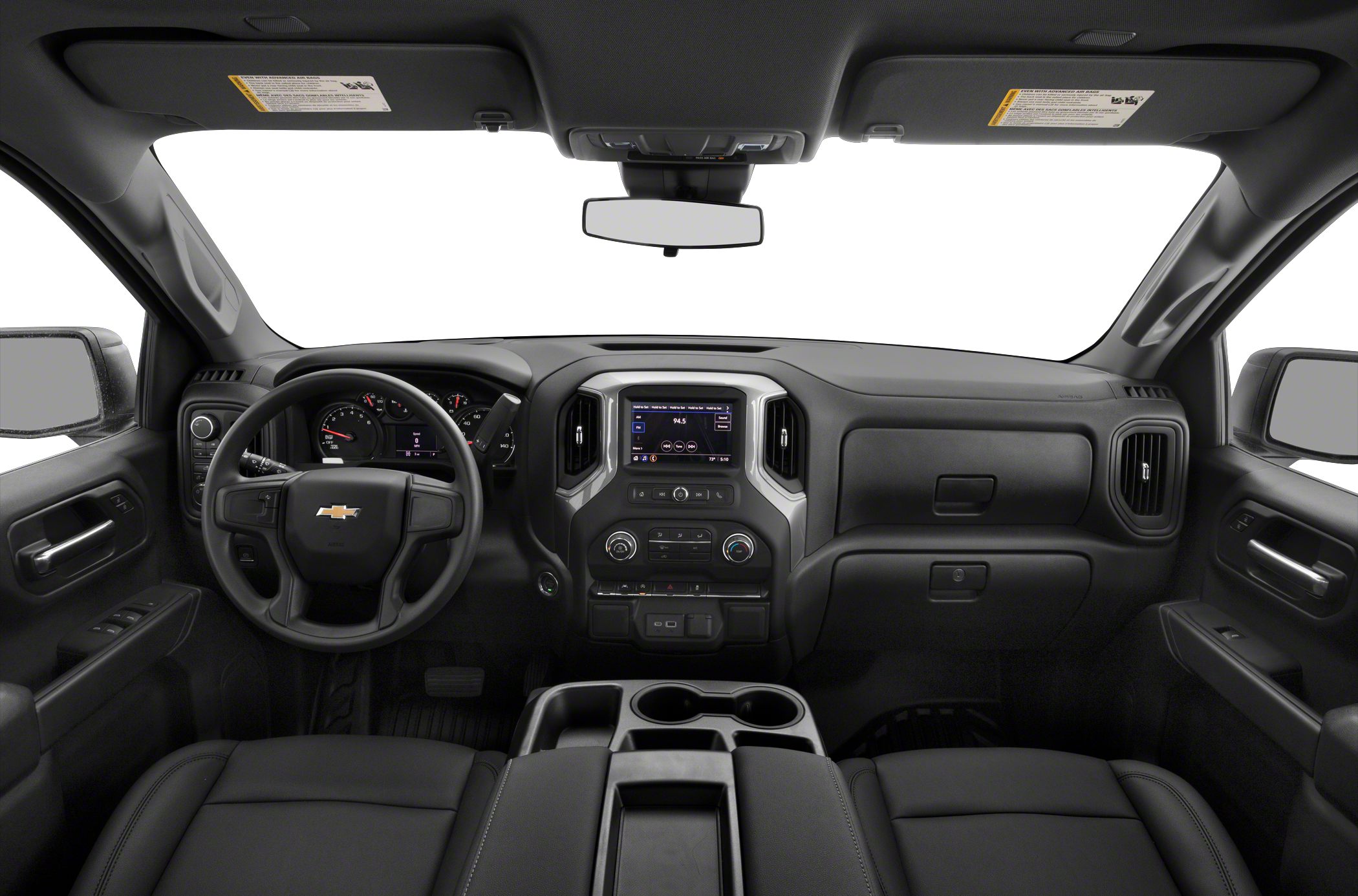 Dashboard and cabin view with touchscreen and steering wheel.