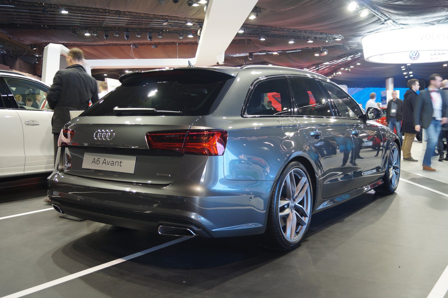 Rear view of luxury station wagon with alloy wheels and tinted windows