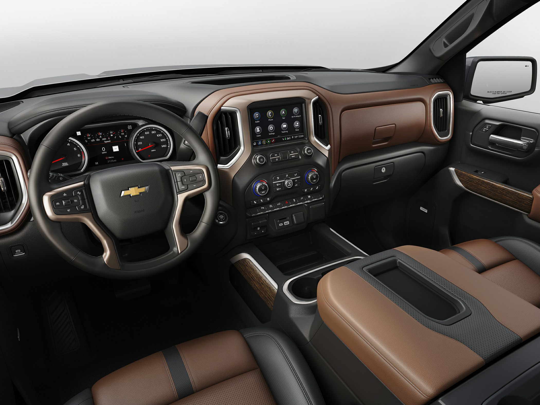 Dashboard, infotainment system, and steering wheel with leather trim