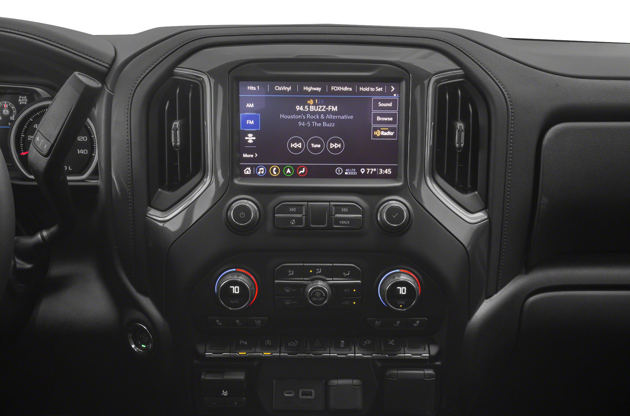 Infotainment touchscreen and dual-zone climate control on dashboard