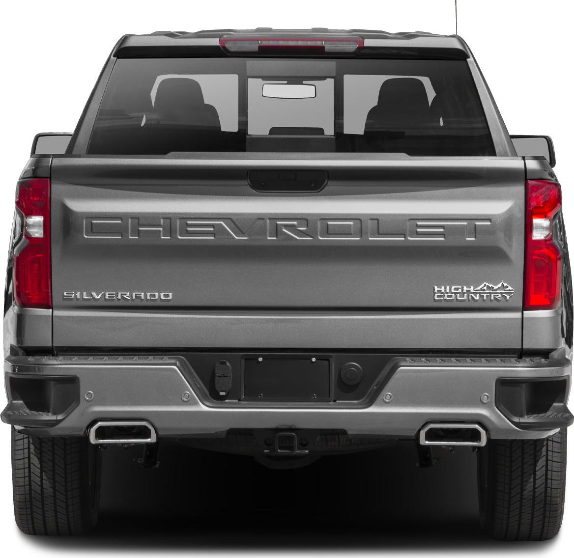 Rear view of Silverado 1500 IV Crew Cab with High Country badge and dual exhaust.
