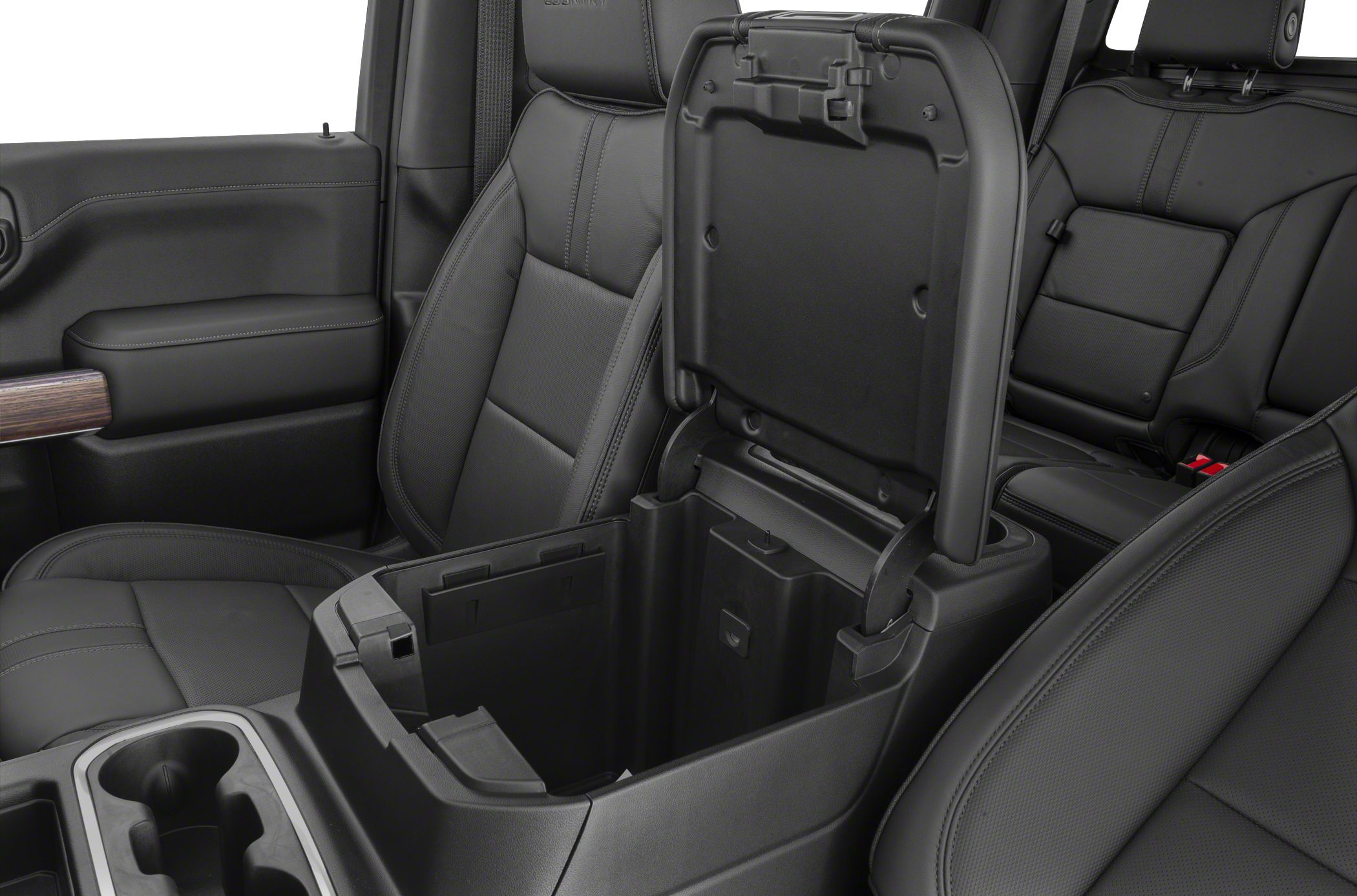 Open center console storage and cup holders in a modern vehicle interior
