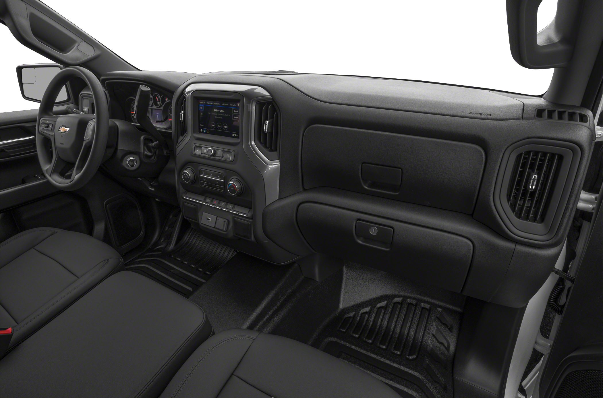 Interior dashboard with steering wheel, infotainment, and control panel.