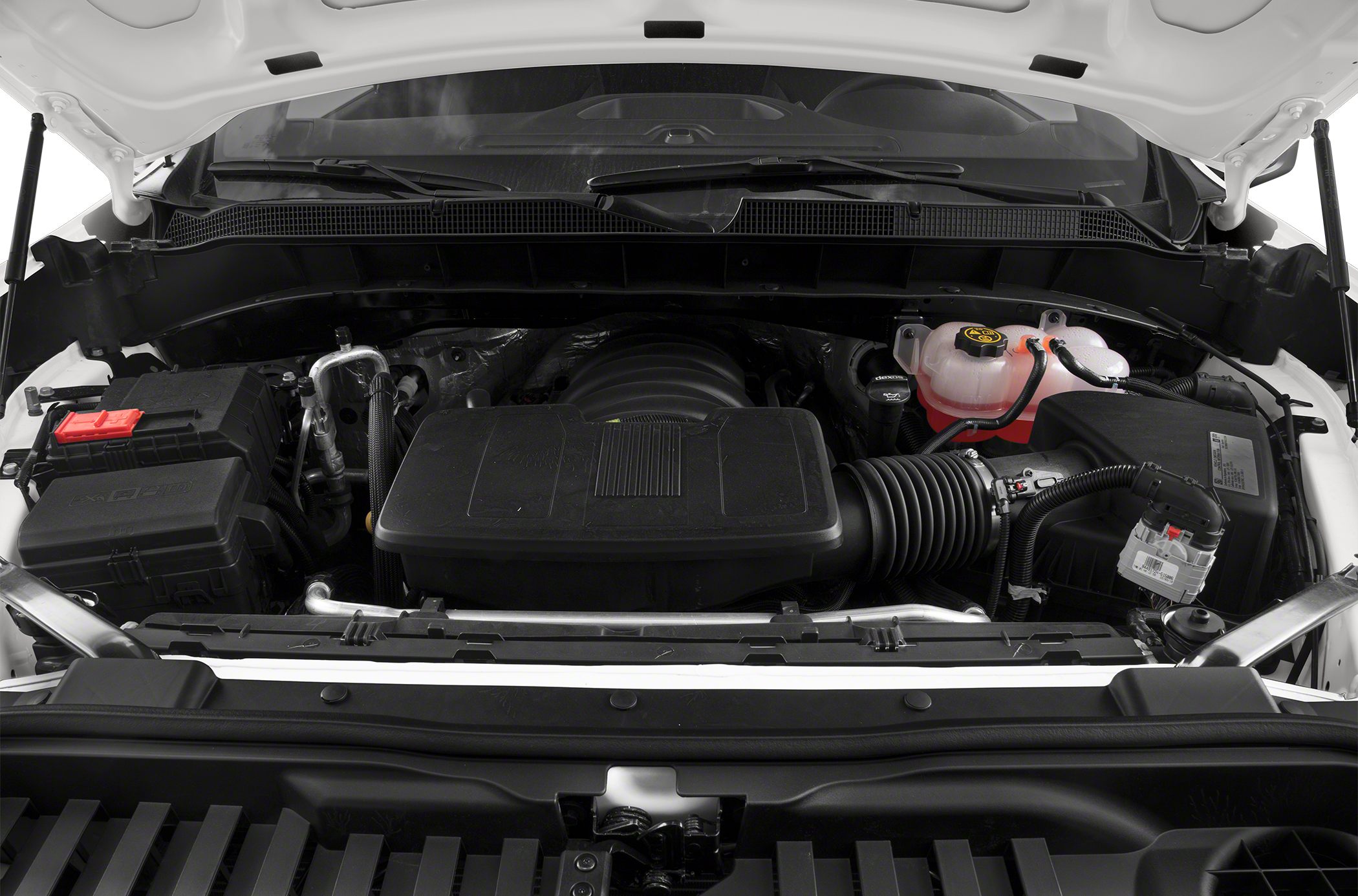 Engine bay with prominent air intake and fluid reservoir