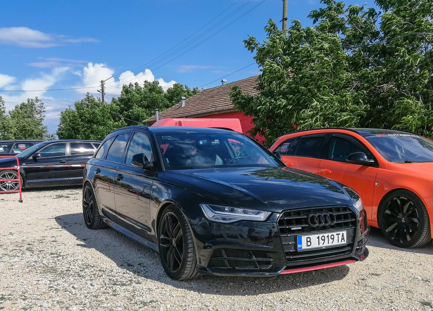 Sporty front and side profile with sleek headlights and aggressive grille